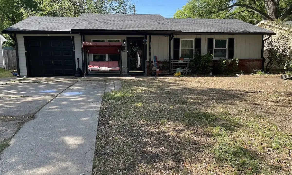Asphalt Shingle Roof Repair crew at work on a residential roof in Lamar